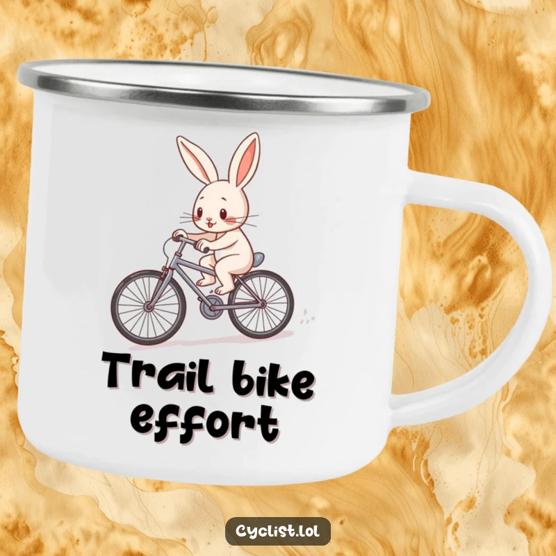Funny determined rabbit character pedaling a tiny bicycle uphill on a camping mug, symbolizing effort and perseverance outdoors.