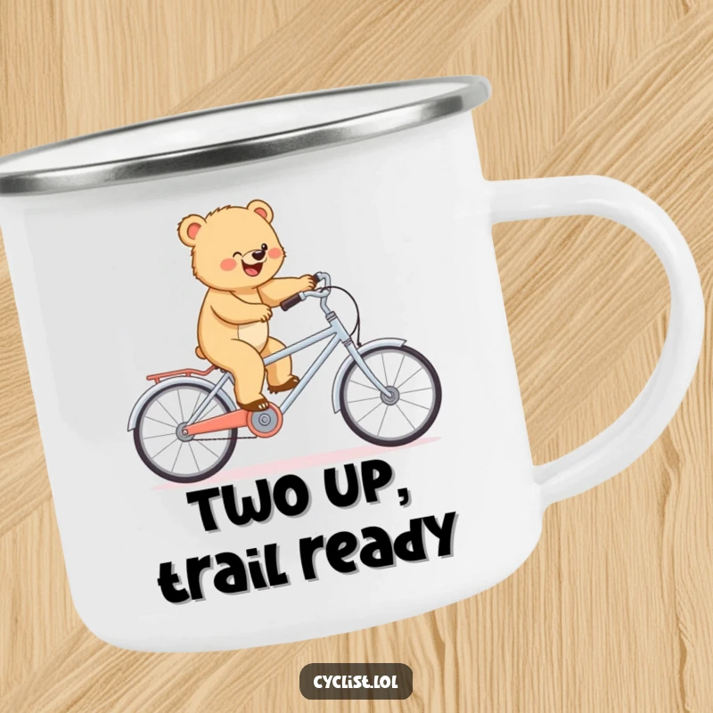Funny camping mug with a determined bear cub balancing on a tiny tandem bike, perfect for adventurous outdoor sipping.