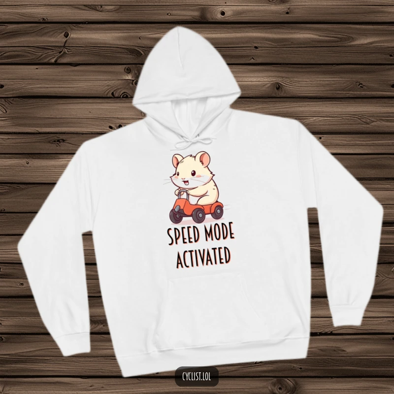 Funny Hoodie showcasing a determined hamster zipping along on a tiny vehicle, embodying pure, unbridled energy.