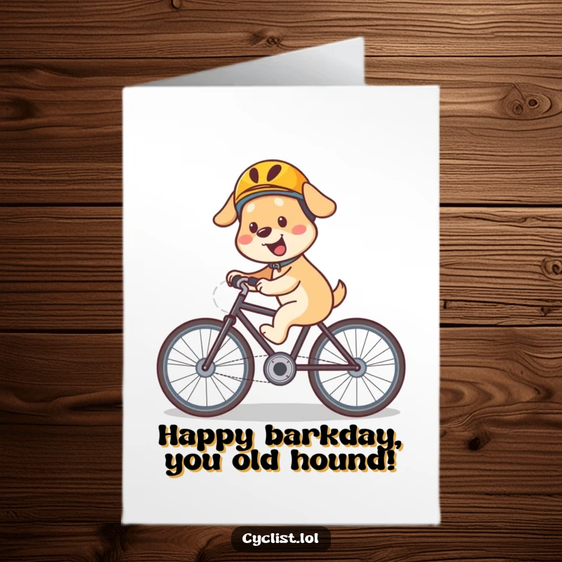 Funny free printable birthday card featuring a happy dog wearing a helmet, speeding downhill on a bicycle.