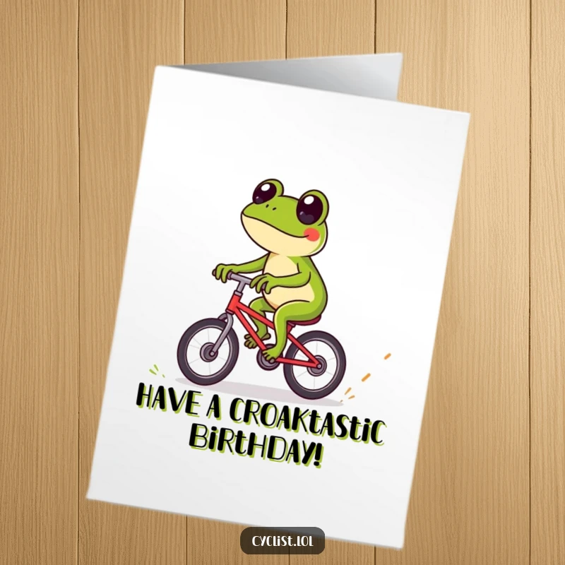 Funny free printable birthday card featuring a playful frog expertly navigating tiny obstacles on a bicycle.