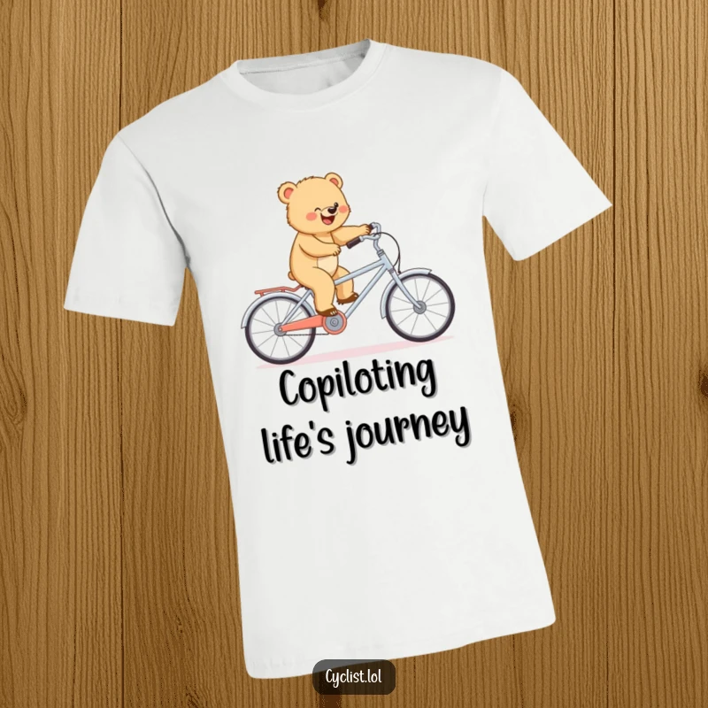 Funny t-shirt featuring a determined bear cub balancing on a surprisingly small tandem bike, a unique funny gift for outdoor fans.